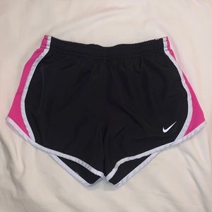 Pink and black Nike shorts